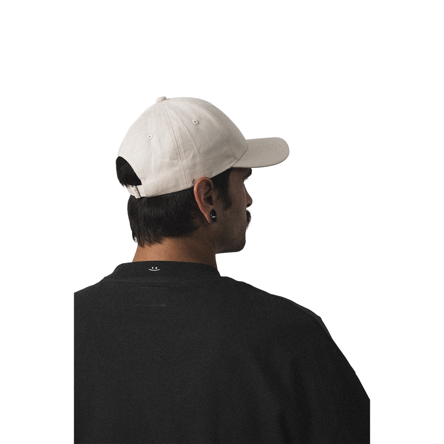 Minimalist beige cap with embroidered I'm not weird design streetwear style model back view