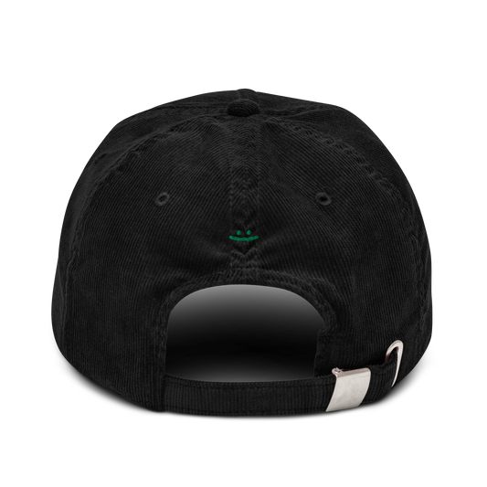 Black corduroy cap, back view – ":)" embroidery, silver adjustable buckle strap