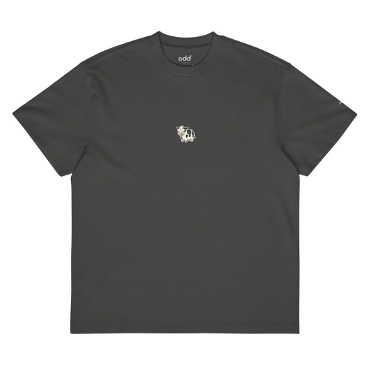vintage black boxy oversized unisex t-shirt, front view, happy looking cow print