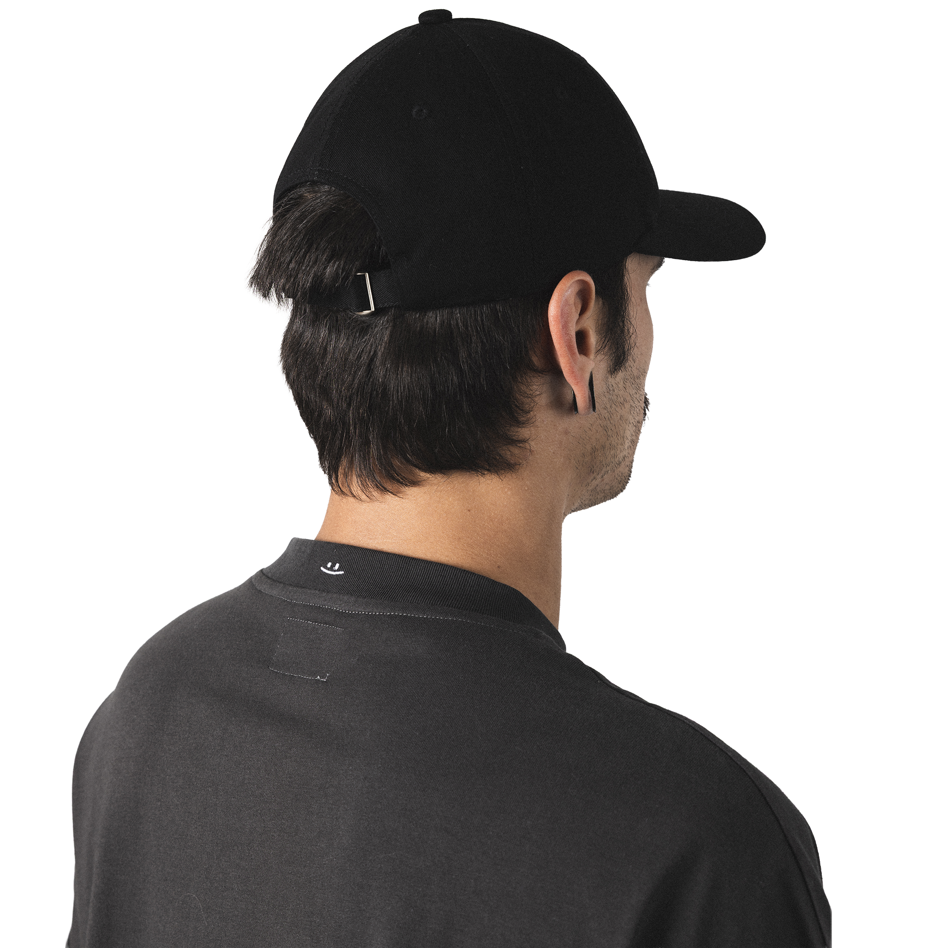 Oversized heavy cotton t-shirt closeup back model view minimalist not weird design with smiley embroidery