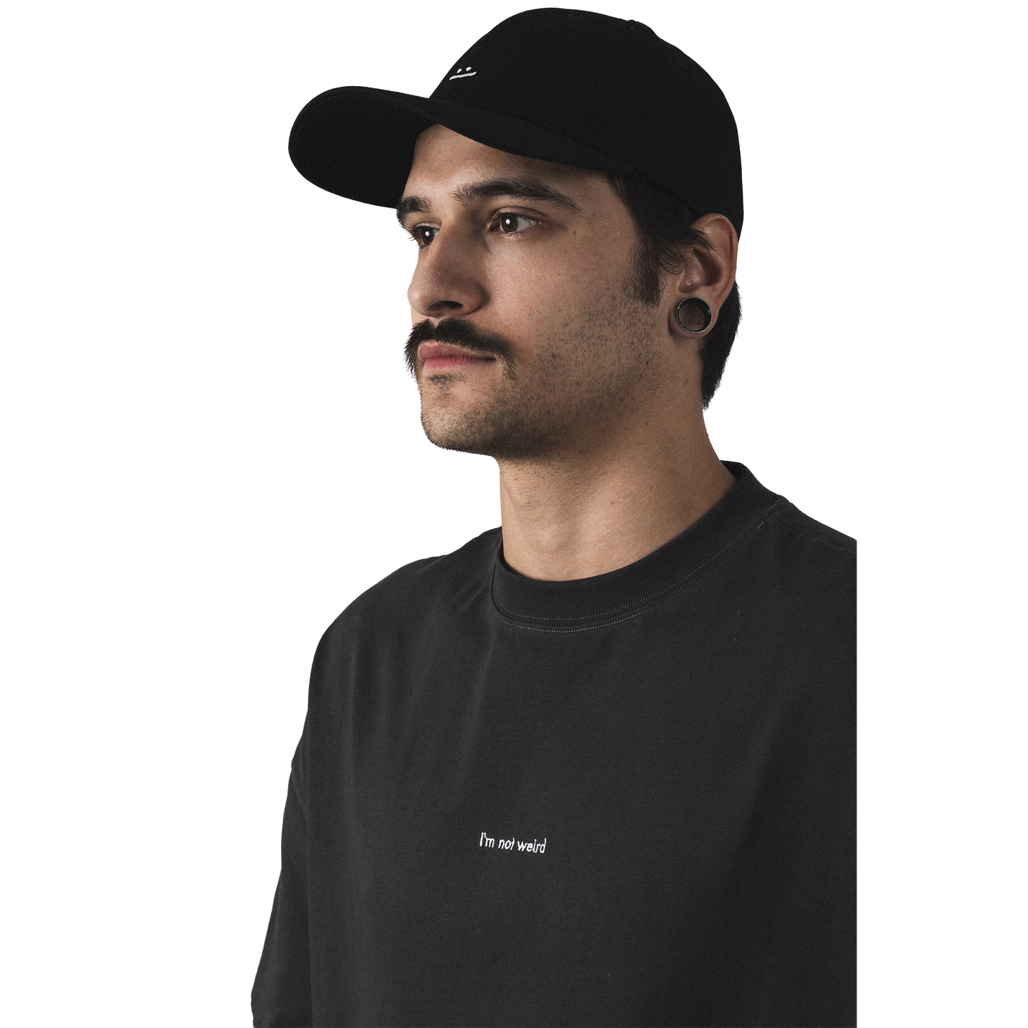 Oversized heavy cotton t-shirt closeup front model view minimalist not weird design with embroidery