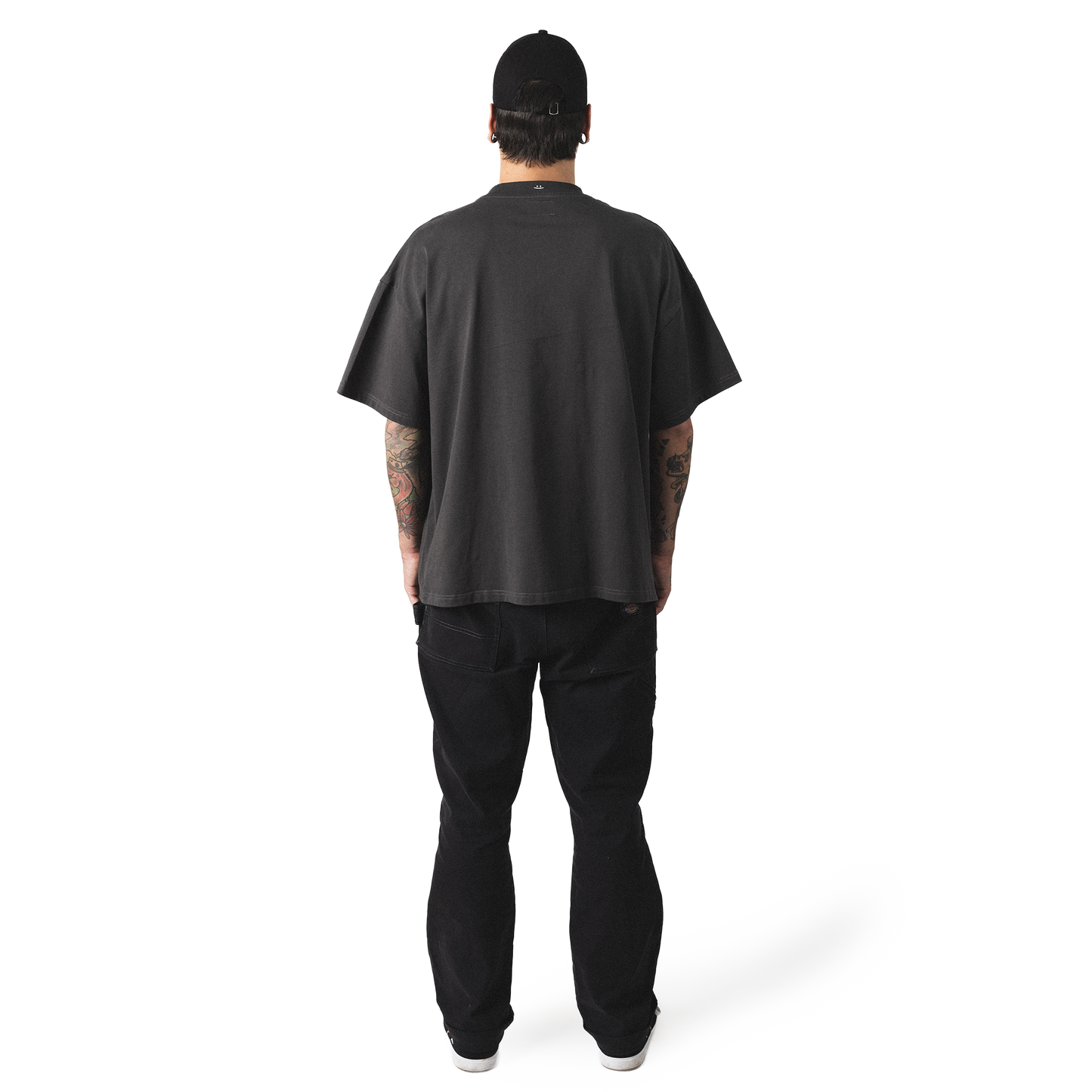 Oversized heavy cotton t-shirt back model view minimalist not weird design with smiley embroidery