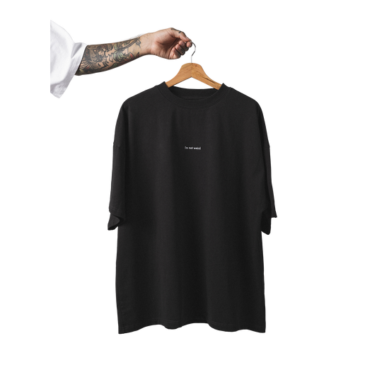 Oversized heavy cotton t-shirt front view minimalist not weird embroidery design