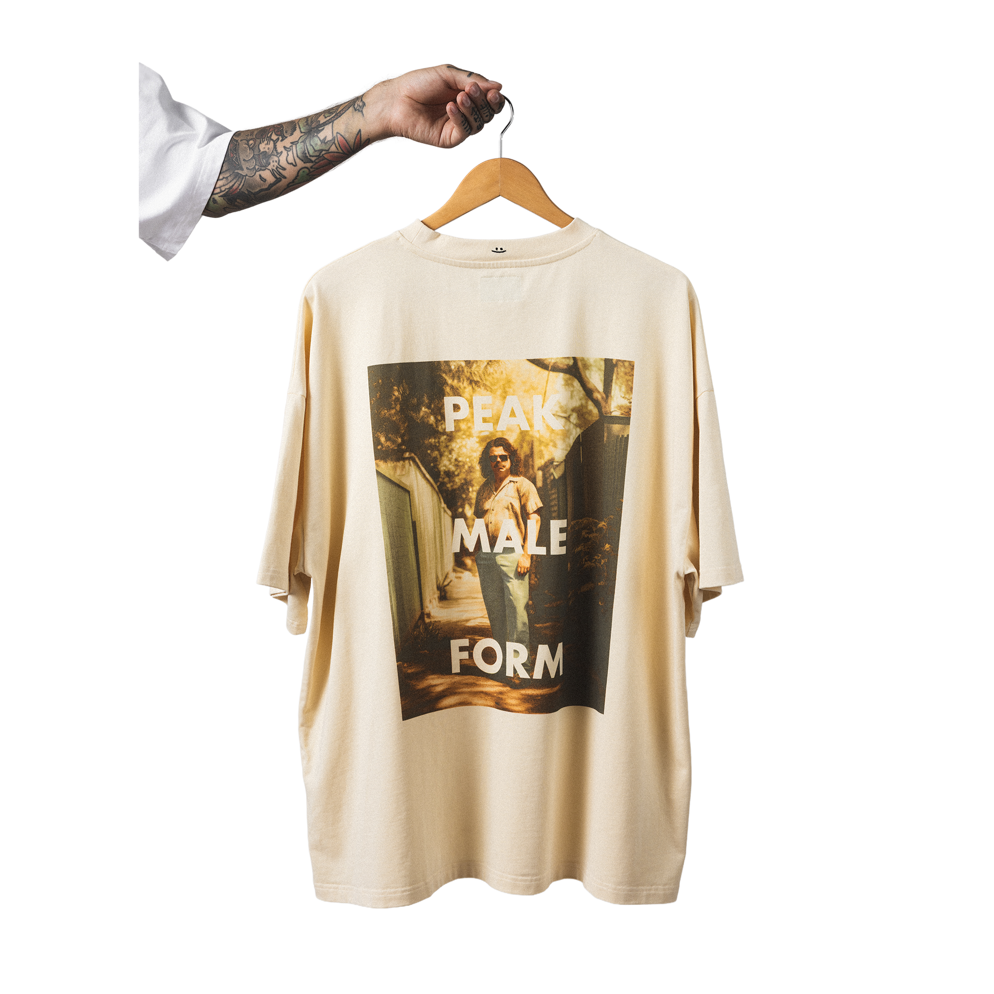 Oversized heavy cotton t-shirt back view minimalist peak male form design back print with smiley embroidery