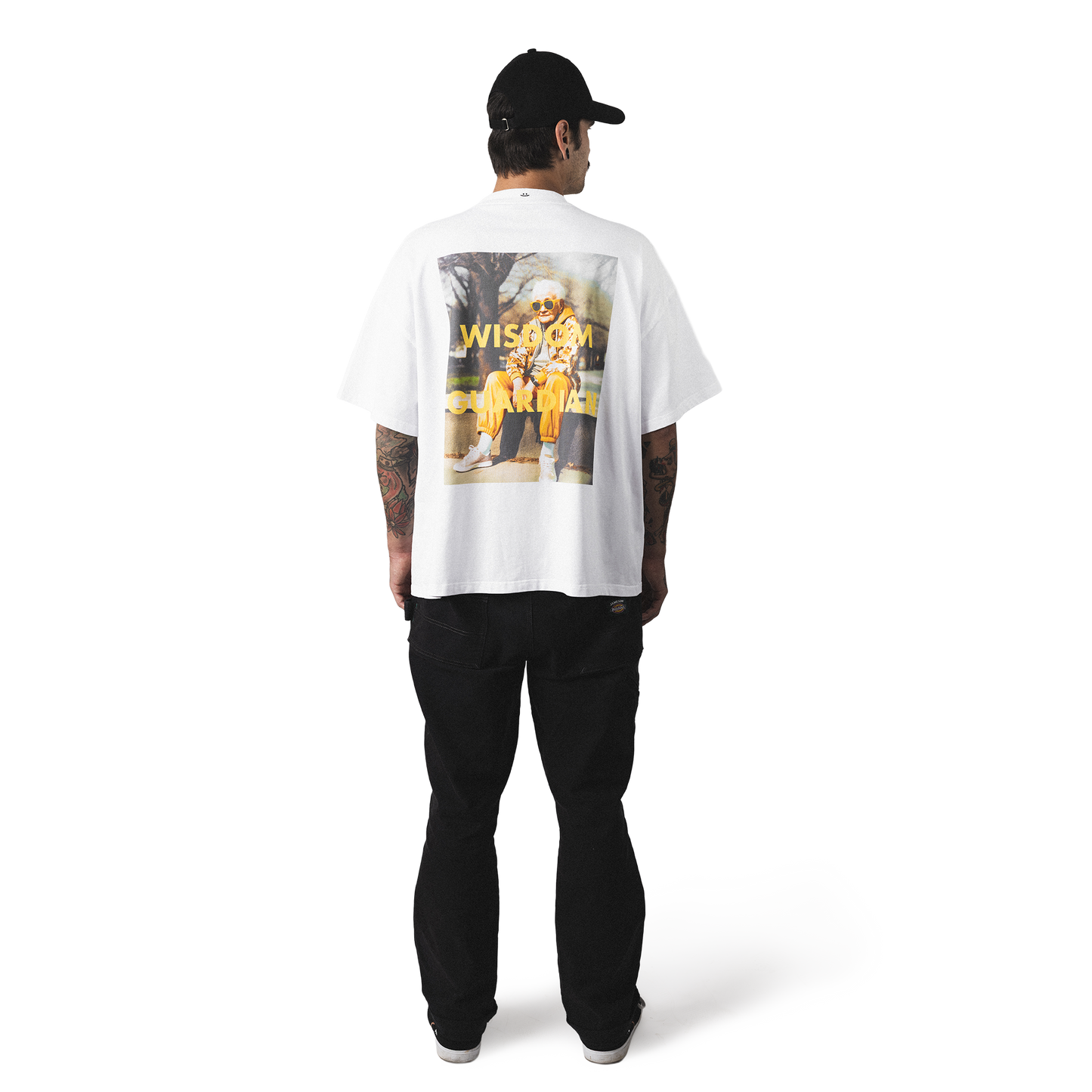 Oversized heavy cotton t-shirt back model view minimalist wisdom guardian back print design with smiley embroidery