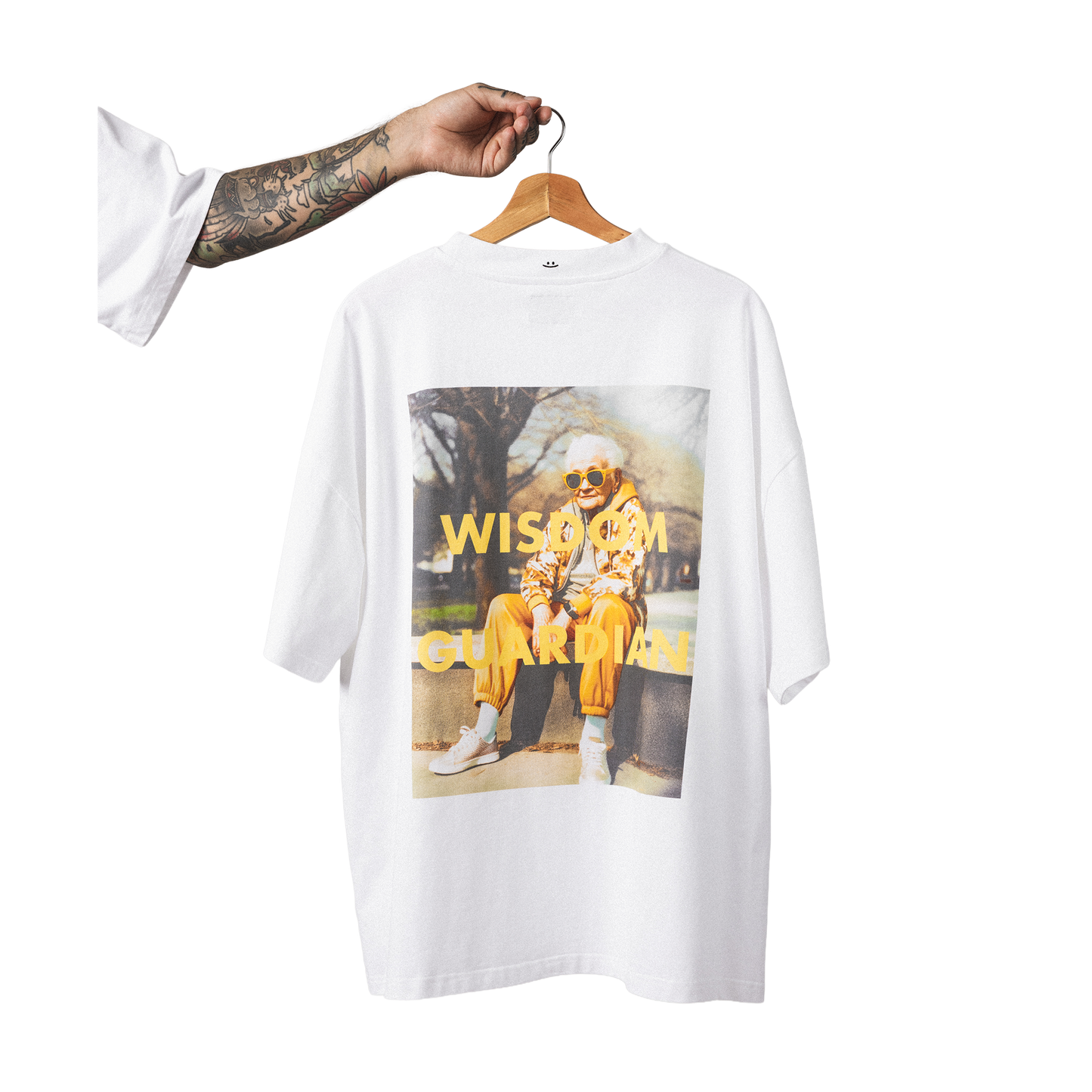 Oversized heavy cotton t-shirt back view minimalist wisdom guardian back print  design with smiley embroidery