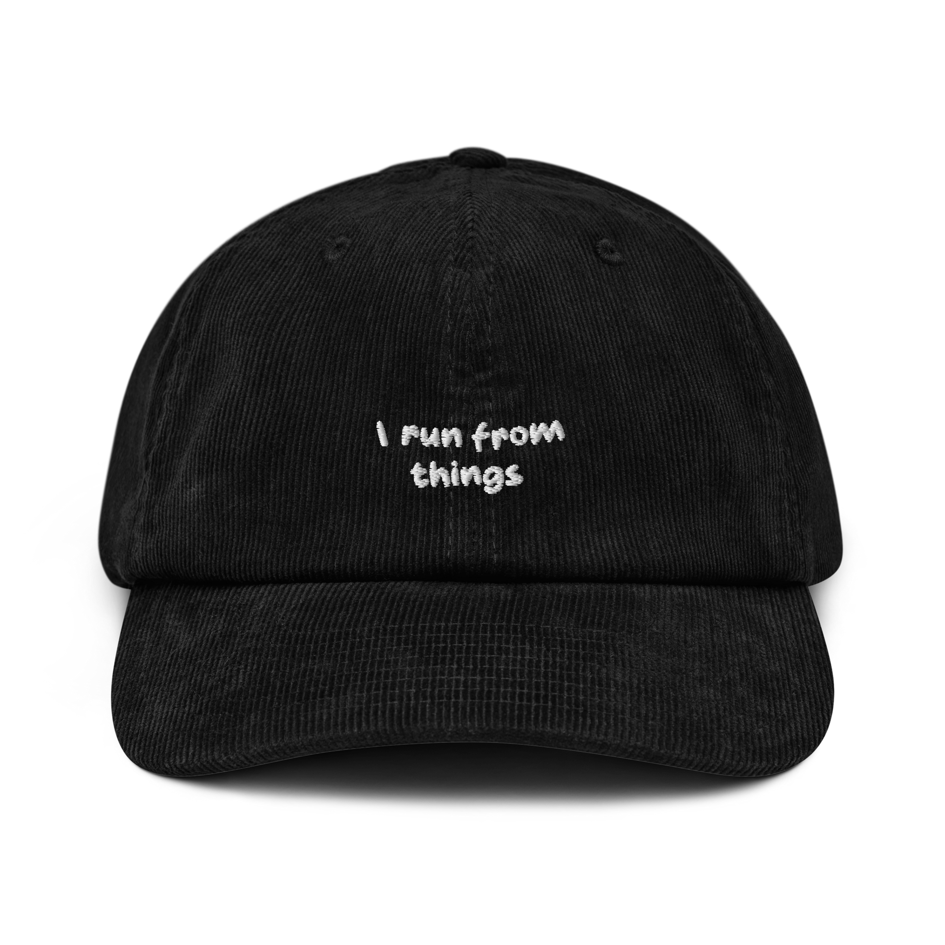 Black corduroy cap, front view - "I run from things" white embroidery on crown