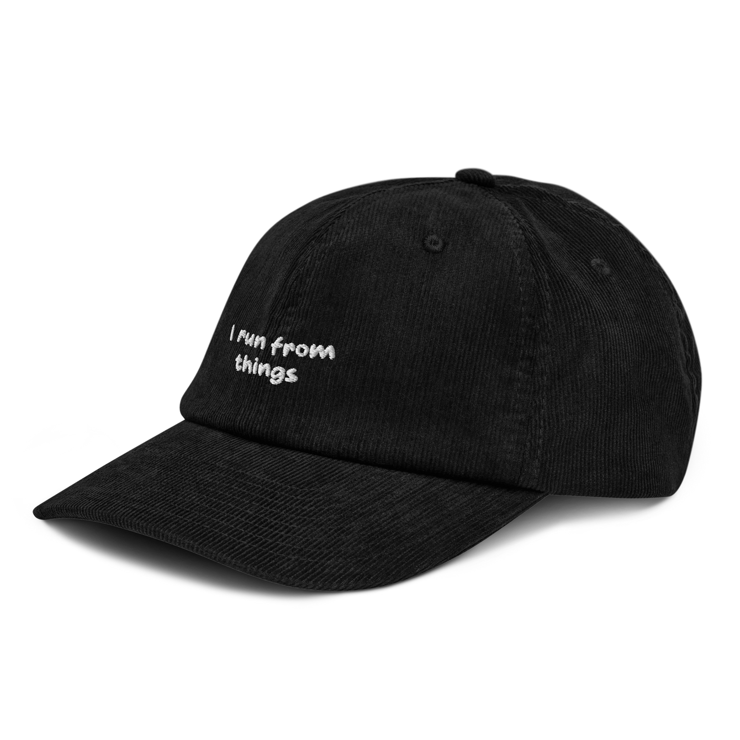 Black corduroy cap, three-quarter front view - "I run from things" embroidery detail