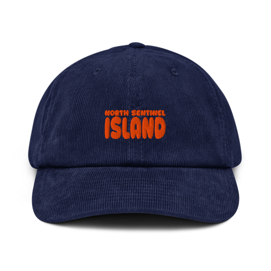 oddjuice north sentinel cap – navy corduroy 6-panel dad cap with orange "NORTH SENTINEL ISLAND" embroidery on front, front view